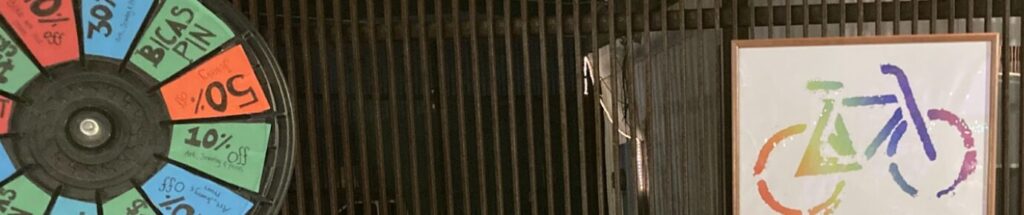 thin photo with prize wheel and bike print